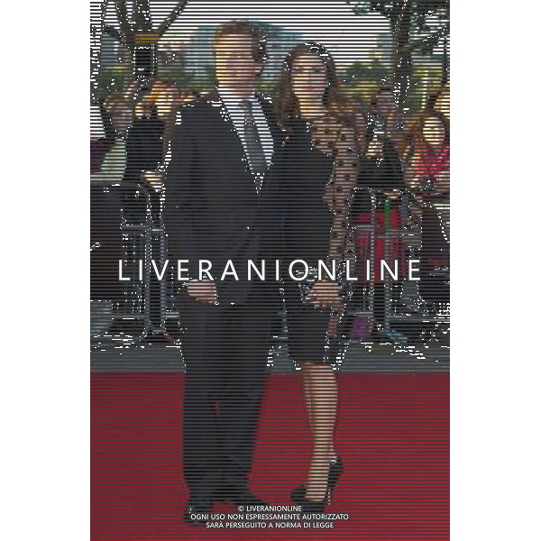 LONDON, UNITED KINGDOM 13 SEPTEMBER : Pic Shows Livia Giuggioli; Colin Firth attending the UK film premier for Tinker, Tailor, Soldier, Spy on September, 13th, 2011 in London, England