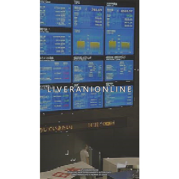 (110914) -- TOKYO, Sept. 14, 2011 () -- A man stands in front of stock share price boards at the Tokyo Stock Exchange in Tokyo, capital of Japan, Sept. 14, 2011. The benchmark Nikkei 225 Average on Wednesday lost 97.98 points, or 1.14 percent from Tuesday to 8,518.57, marking a fresh closing low since April 28, 2009. The broader Topix index was down 8.13 points, or 1.08 percent, at 741.69. (/Kenichiro Seki) (yh)