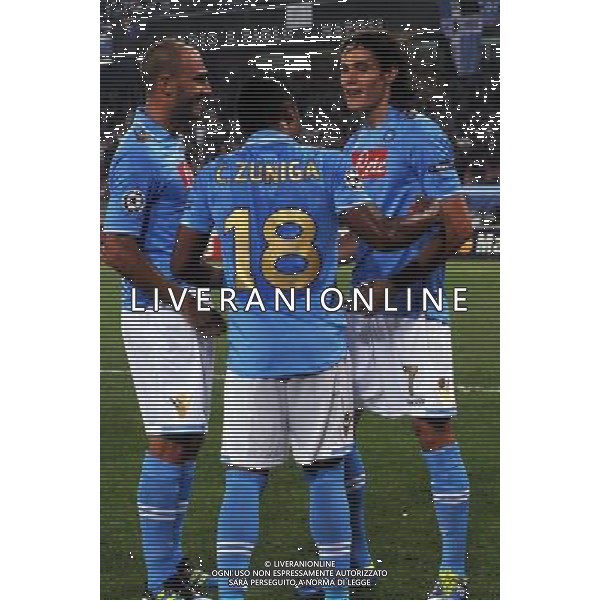 NAPOLI - VILLAREAL CHAMPIONS LEAGUE 27/09/2011 NELLA FOTO: ESULTANZA DOPO IL GOL SU RIGORE DI EDINSON CAVANI CON ZUNIGA ©MOSCA/AGENZIA ALDO LIVERANI SAS