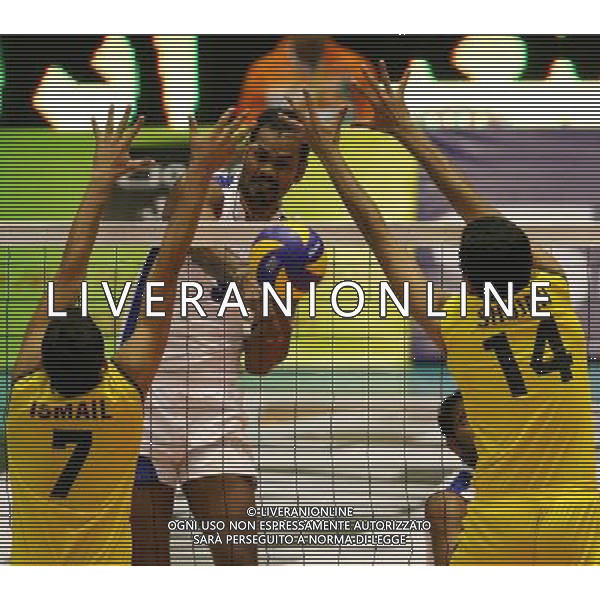 TEHRAN, Sept. 26, 2011 Singh Sube (C) of Indian spikes the ball during the match against Pakistan at the 16th Asian Men\'s Volleyball Championship in Tehran, capital of Iran, on Sept. 26, 2011. Indian won 3 2.(/Ahmad Halabisaz) / Tehran, Iran , Campionato maschile di Volley Cina VS Australia - AG. ALDO LIVERANI SAS- ITALY ONLY *** Local Caption *** .