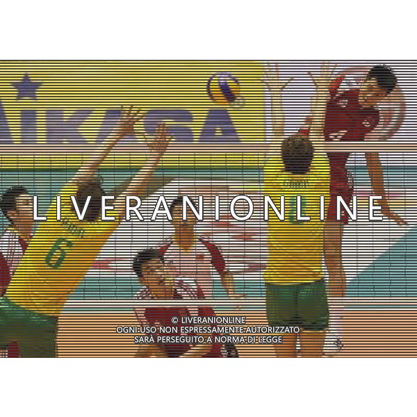 (110926) -- TEHRAN, Sept. 26, 2011 () -- China\'s Zhang Chen (top) spikes the ball during the match against Australia at the 16th Asian Men\'s Volleyball Championship in Tehran, capital of Iran, on Sept. 26, 2011. Australia won 3-1. (/Ahmad Halabisaz) / Tehran, Iran , Campionato maschile di Volley Cina VS Australia - AG. ALDO LIVERANI SAS- ITALY ONLY *** Local Caption *** .