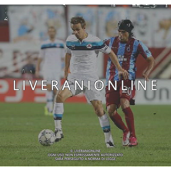 UEFA Champions league group B football match between Trabzonspor and Lille at Avni Aker Stadium in Trabzon, Turkey. 27.09.2011 Pictured: Benoit Pedretti (L) of Lille and Gustavo Colman (R) of Trabzonspor. LIGA MISTRZOW SEZON 2011/2012 PILKA NOZNA TRABZONSPOR vs LILLE FOT. SESKIM/NEWSPIX.PL TURKEY, GERMANY, AUSTRIA AND UK OUT !!! --- Newspix.pl TRABZONSPOR vs LILLE UEFA CHAMPIONS LEAGUE PH.AG ALDO LIVERANI SAS ITALY ONLY *** Local Caption *** .