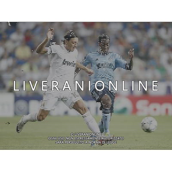 Real Madrid\'s Mesut …zil against AFC Ajax Amsterdam\'s Vurnon Anita during UEFA Champions League match. September 27, 2011. (ALTERPHOTOS/Alvaro Hernandez) /AG ALDO LIVERAN SAS ITALY ONLY