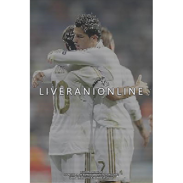 Real Madrid\'s Cristiano Ronaldo celebrates with Mesut …zil during UEFA Champions League match. September 27, 2011. (ALTERPHOTOS/Alvaro Hernandez) /AG ALDO LIVERAN SAS ITALY ONLY