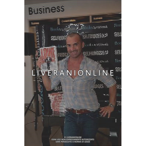 Star of Pineapple Dance Studios Louie Spence signing copies of his autobiography, Still Got It, Never Lost It. at Selfridges London on the 28th September 2011. /Londra , la Star of Pineapple Dance Studios Louie Spence presenta la sua autobiografia - AG. ALDO LIVERANI SAS- ITALY ONLY *** Local Caption *** .