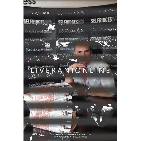 Star of Pineapple Dance Studios Louie Spence signing copies of his autobiography, Still Got It, Never Lost It. at Selfridges London on the 28th September 2011. /Londra , la Star of Pineapple Dance Studios Louie Spence presenta la sua autobiografia - AG. ALDO LIVERANI SAS- ITALY ONLY *** Local Caption *** .