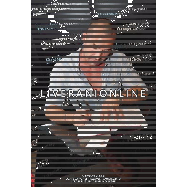 Star of Pineapple Dance Studios Louie Spence signing copies of his autobiography, Still Got It, Never Lost It. at Selfridges London on the 28th September 2011. /Londra , la Star of Pineapple Dance Studios Louie Spence presenta la sua autobiografia - AG. ALDO LIVERANI SAS- ITALY ONLY *** Local Caption *** .