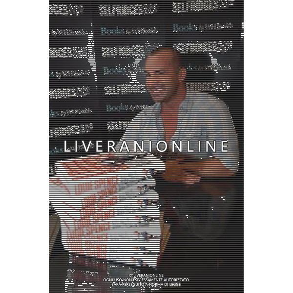 Star of Pineapple Dance Studios Louie Spence signing copies of his autobiography, Still Got It, Never Lost It. at Selfridges London on the 28th September 2011. /Londra , la Star of Pineapple Dance Studios Louie Spence presenta la sua autobiografia - AG. ALDO LIVERANI SAS- ITALY ONLY *** Local Caption *** .