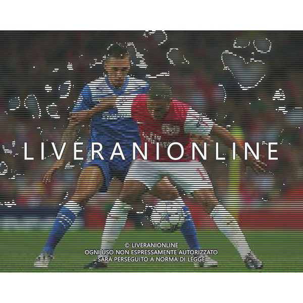 Arsenal\'s Alex Oxlade-Chamberlain battles with Olympiacos Jose Holebas Football - UEFA Champions League - Group F - Arsenal v Olympiacos FC - Wed 28 Sep 2011 - Emirates Stadium - London - UK Foto: Michal Zemanek / Newspix.pl LIGA MISTRZOW SEZON 2011/2012 PILKA NOZNA ARSENAL LONDYN vs OLYMPIAKOS PIREUS --- Newspix.pl ARSENAL OLYMPIACOS - CHAMPIONS LEAGUE - ©AG ALDO LIVERANI SAS ITALY ONLY -. *** Local Caption *** .