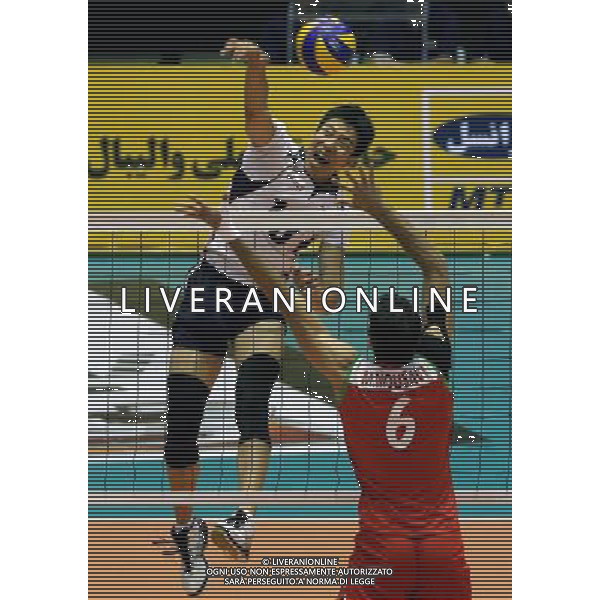 (110929) TEHRAN, Sept. 29, 2011 () Yung Suk Shin of South Korea (Back) spikes the ball during the semifinal against Iran at the 16th Asian Men\'s Volleyball Championship in Tehran, Iran, Sept. 28, 2011. South Korea lost 1 3. (/Ahmad Halabisaz) / Tehran, Iran , Campionato maschile di Volley - AG. ALDO LIVERANI SAS- ITALY ONLY *** Local Caption *** .