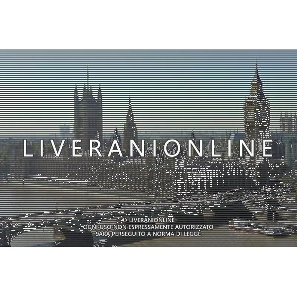 Houses of Parliament, London. The name Big Ben is often used to describe the tower, the clock and the bell but the name was first given to the Great Bell. The Clock Tower was completed in 1859 and the Great Clock started on 31 May, with the Great Bell\'s strikes heard for the first time on 11 July and the quarter bells first chimed on 7 September. / Londra , Gran Bretagna , vedute della citta\' , Parlamento , Big Ben - AG. ALDO LVERANI SAS- ITALY ONLY *** Local Caption *** .