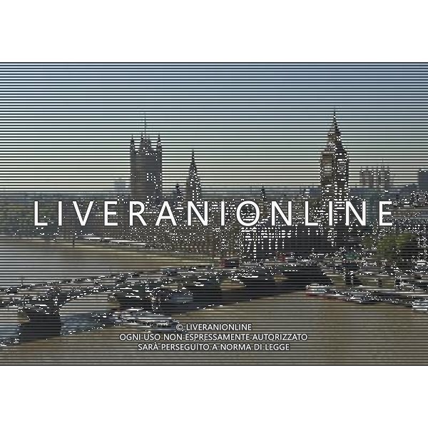 Houses of Parliament, London. The name Big Ben is often used to describe the tower, the clock and the bell but the name was first given to the Great Bell. The Clock Tower was completed in 1859 and the Great Clock started on 31 May, with the Great Bell\'s strikes heard for the first time on 11 July and the quarter bells first chimed on 7 September. / Londra , Gran Bretagna , vedute della citta\' , Parlamento , Big Ben - AG. ALDO LVERANI SAS- ITALY ONLY *** Local Caption *** .