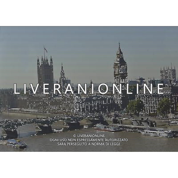 Houses of Parliament, London. The name Big Ben is often used to describe the tower, the clock and the bell but the name was first given to the Great Bell. The Clock Tower was completed in 1859 and the Great Clock started on 31 May, with the Great Bell\'s strikes heard for the first time on 11 July and the quarter bells first chimed on 7 September. / Londra , Gran Bretagna , vedute della citta\' , Parlamento , Big Ben - AG. ALDO LVERANI SAS- ITALY ONLY *** Local Caption *** .