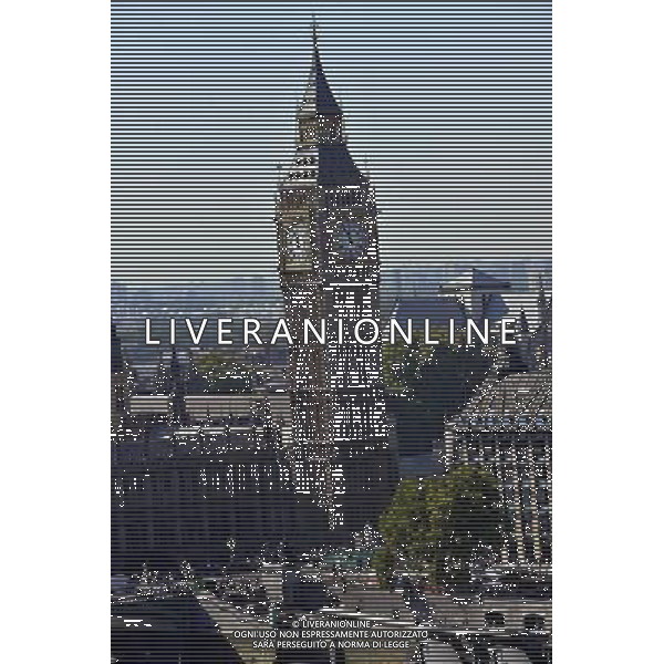 Houses of Parliament, London. The name Big Ben is often used to describe the tower, the clock and the bell but the name was first given to the Great Bell. The Clock Tower was completed in 1859 and the Great Clock started on 31 May, with the Great Bell\'s strikes heard for the first time on 11 July and the quarter bells first chimed on 7 September. / Londra , Gran Bretagna , vedute della citta\' , Parlamento , Big Ben - AG. ALDO LVERANI SAS- ITALY ONLY *** Local Caption *** .