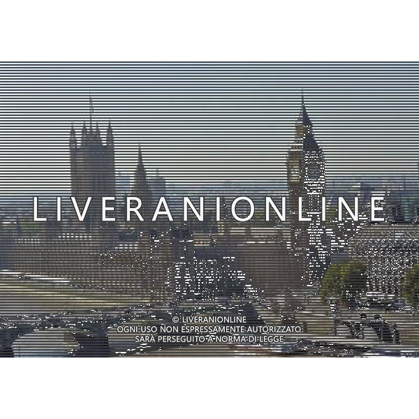 Houses of Parliament, London. The name Big Ben is often used to describe the tower, the clock and the bell but the name was first given to the Great Bell. The Clock Tower was completed in 1859 and the Great Clock started on 31 May, with the Great Bell\'s strikes heard for the first time on 11 July and the quarter bells first chimed on 7 September. / Londra , Gran Bretagna , vedute della citta\' , Parlamento , Big Ben - AG. ALDO LVERANI SAS- ITALY ONLY *** Local Caption *** .