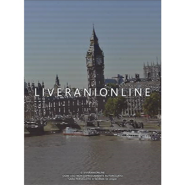 Houses of Parliament, London. The name Big Ben is often used to describe the tower, the clock and the bell but the name was first given to the Great Bell. The Clock Tower was completed in 1859 and the Great Clock started on 31 May, with the Great Bell\'s strikes heard for the first time on 11 July and the quarter bells first chimed on 7 September. / Londra , Gran Bretagna , vedute della citta\' , Parlamento , Big Ben - AG. ALDO LVERANI SAS- ITALY ONLY *** Local Caption *** .