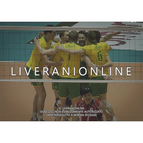 (110930) TEHRAN, Sept. 30, 2011 () Players of Australia cheer after scoring during the match against South Korea at the 16th Asian Men\'s Volleyball Championship in Tehran, Iran, Sept. 29, 2011. Australia lost 1 3 and ranked 4th place. (/Ahmad Halabisaz) / Tehran, Iran , Campionato asiatico maschile di Volley - AG. ALDO LIVERANI SAS- ITALY ONLY *** Local Caption *** .
