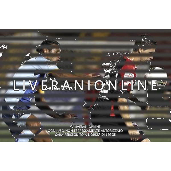 (110930) ALAJUELA, Sept. 30, 2011 () Pablo Gabas (R) of Liga Deportiva Alajuelense of Costa Rica vies with Milton Reyes of Motagua of Honduras during the CONCACAF Champions League soccer match held at Alejandro Morera Soto stadium, in Alajuela, Costa Rica, on Sept. 29, 2011. (/Kent Gilbert) (py) ? ? ? ? ? ? ? ? / AG. ALDO LIVERANI SAS- ITALY ONLY *** Local Caption *** .