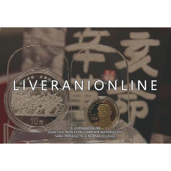 (110930) -- BEIJING, Sept. 30, 2011 () -- Photo taken on Sept. 30, 2011 shows the 1911 Revolution commemorative coins during an issue ceremony in Beijing, capital of China. The People\'s Bank of China (PBOC), the country\'s central bank, issued a set of commemorative coins on Friday to mark the centennial of the epoch-making 1911 Xinhai Revolution. This set of coins includes one gold and one silver coin. (/Chen Xiaogen)(mcg) ©AG ALDO LIVERANI SAS ITALY ONLY *** Local Caption *** .