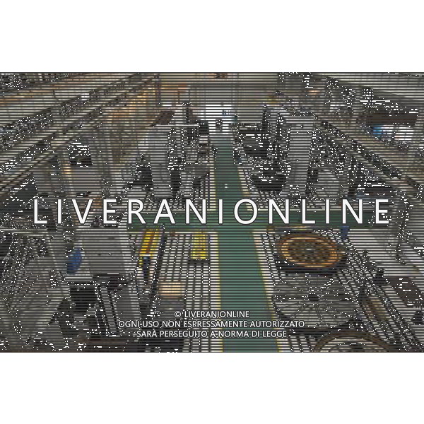 (110930) -- BEIJING, Sept. 30, 2011 () -- File photo taken on Nov. 30, 2010 shows a workshop of Wuhan Heavy Duty Machine Tool Group Corporation in Wuhan, central China\'s Hubei Province. Can you imagine what the industry of China, now enjoys the title of \'World Factory\', was like a century ago? In 1905, when the imperial Qing government sent five senior officials to Japan and some Western countries to visit, seeking for solutions to save the decaying empire, \'Yanchang Oil Plant\', the first-ever oil enterprise in the Chinese mainland, was established in Yan\'an of northwest China\'s Shaanxi Province. In 1907, Yanchang drilled the first onshore oil well \'Yanyi Well\', starting the oil production in the Chinese mainland. However, in 1907, the oil output could only reach 1 to 1.5 tonnes per day. More than 100 years passed, Yanchang, now called Shaanxi Yanchang Petroleum (Group) Co., LTD, has made great development. In 2007, the crude oil output, oil refining and processing, and sales of oil products of Yanchang respectively exceeded 10 million tonnes, engendering it into an emerging large oilfield with the output of 10 million tonnes. Yanchang is an epitome of Chinese industry\'s centennial development since the 1911 Revolution. The 1911 Revolution, led by Dr. Sun Yat-sen, overthrew the Qing Dynasty (1644-1911) and also put an end to thousands of years of feudalist governance in China. After the revolution, Chinese industry developed as many Chinese factories, in the fields such as textile, flour, match, and steel and iron, were established at that time. However, most Chinese factories were in small scale and did not thrive for a long time. After the founding of the People\'s Republic of China in 1949, step by step, Chinese industry has formed an independent and integral modern industry system with considerable scale and relatively high technical level. Especially in the 30 years after the Chinese government implemented the reform and opening-up ©AG ALDO LIVERANI SAS ITALY ONLY *** Local Caption *** .