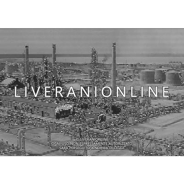 (110930) -- BEIJING, Sept. 30, 2011 () -- File photo taken in 1965 shows an oil refinery of Daqing oilfield in Daqing, northeast China\'s Heilongjiang Province. Can you imagine what the industry of China, now enjoys the title of \'World Factory\', was like a century ago? In 1905, when the imperial Qing government sent five senior officials to Japan and some Western countries to visit, seeking for solutions to save the decaying empire, \'Yanchang Oil Plant\', the first-ever oil enterprise in the Chinese mainland, was established in Yan\'an of northwest China\'s Shaanxi Province. In 1907, Yanchang drilled the first onshore oil well \'Yanyi Well\', starting the oil production in the Chinese mainland. However, in 1907, the oil output could only reach 1 to 1.5 tonnes per day. More than 100 years passed, Yanchang, now called Shaanxi Yanchang Petroleum (Group) Co., LTD, has made great development. In 2007, the crude oil output, oil refining and processing, and sales of oil products of Yanchang respectively exceeded 10 million tonnes, engendering it into an emerging large oilfield with the output of 10 million tonnes. Yanchang is an epitome of Chinese industry\'s centennial development since the 1911 Revolution. The 1911 Revolution, led by Dr. Sun Yat-sen, overthrew the Qing Dynasty (1644-1911) and also put an end to thousands of years of feudalist governance in China. After the revolution, Chinese industry developed as many Chinese factories, in the fields such as textile, flour, match, and steel and iron, were established at that time. However, most Chinese factories were in small scale and did not thrive for a long time. After the founding of the People\'s Republic of China in 1949, step by step, Chinese industry has formed an independent and integral modern industry system with considerable scale and relatively high technical level. Especially in the 30 years after the Chinese government implemented the reform and opening-up drive, Chinese industry e ©AG ALDO LIVERANI SAS ITALY ONLY *** Local Caption *** .