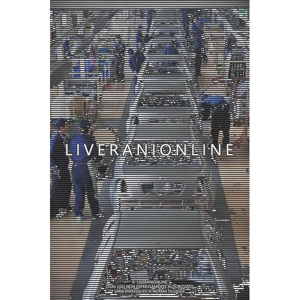 (110930) -- BEIJING, Sept. 30, 2011 () -- File photo taken on Jan. 15, 2010 shows staff work at a assembly line at a Geely factory in Lanzhou, northwest China\'s Gansu Province. In 2010, China\'s car output topped 18.26 million and China\'s auto sales hit 18.06 million, ensuring the country\'s position as the world\'s biggest car producer and market for a second year. Can you imagine what the industry of China, now enjoys the title of \'World Factory\', was like a century ago? In 1905, when the imperial Qing government sent five senior officials to Japan and some Western countries to visit, seeking for solutions to save the decaying empire, \'Yanchang Oil Plant\', the first-ever oil enterprise in the Chinese mainland, was established in Yan\'an of northwest China\'s Shaanxi Province. In 1907, Yanchang drilled the first onshore oil well \'Yanyi Well\', starting the oil production in the Chinese mainland. However, in 1907, the oil output could only reach 1 to 1.5 tonnes per day. More than 100 years passed, Yanchang, now called Shaanxi Yanchang Petroleum (Group) Co., LTD, has made great development. In 2007, the crude oil output, oil refining and processing, and sales of oil products of Yanchang respectively exceeded 10 million tonnes, engendering it into an emerging large oilfield with the output of 10 million tonnes. Yanchang is an epitome of Chinese industry\'s centennial development since the 1911 Revolution. The 1911 Revolution, led by Dr. Sun Yat-sen, overthrew the Qing Dynasty (1644-1911) and also put an end to thousands of years of feudalist governance in China. After the revolution, Chinese industry developed as many Chinese factories, in the fields such as textile, flour, match, and steel and iron, were established at that time. However, most Chinese factories were in small scale and did not thrive for a long time. After the founding of the People\'s Republic of China in 1949, step by step, Chinese industry has formed an independent and i ©AG ALDO LIVERANI SAS ITALY ONLY *** Local Caption *** .