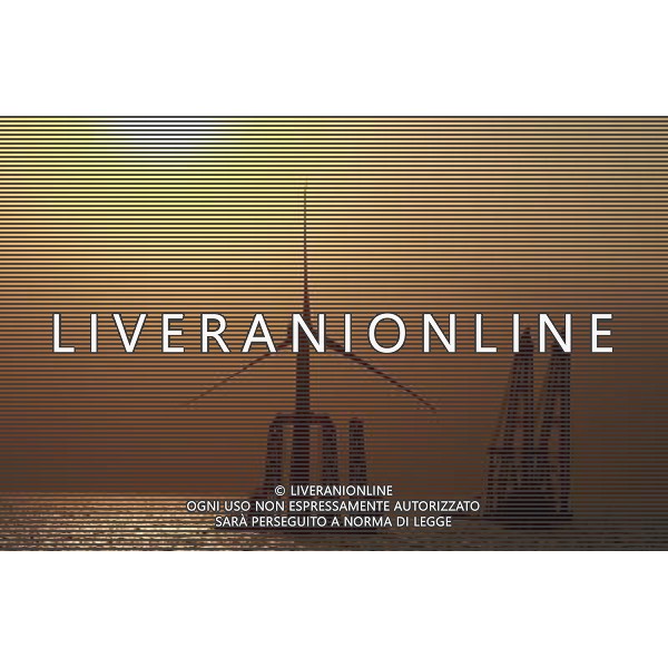 (110930) -- BEIJING, Sept. 30, 2011 () -- File photo taken on Sept. 5, 2011 shows a wind turbine of the second-phase project being installed at Donghai Bridge Offshore Wind Farm in Shanghai, east China. The Donghai Bridge Wind Farm, the first offshore wind farm in China, has generated over 200 million kwh of power since it started operation in June 2010. The clean energy project could cut CO2 emissions by more than 237,400 tonnes per year. Can you imagine what the industry of China, now enjoys the title of \'World Factory\', was like a century ago? In 1905, when the imperial Qing government sent five senior officials to Japan and some Western countries to visit, seeking for solutions to save the decaying empire, \'Yanchang Oil Plant\', the first-ever oil enterprise in the Chinese mainland, was established in Yan\'an of northwest China\'s Shaanxi Province. In 1907, Yanchang drilled the first onshore oil well \'Yanyi Well\', starting the oil production in the Chinese mainland. However, in 1907, the oil output could only reach 1 to 1.5 tonnes per day. More than 100 years passed, Yanchang, now called Shaanxi Yanchang Petroleum (Group) Co., LTD, has made great development. In 2007, the crude oil output, oil refining and processing, and sales of oil products of Yanchang respectively exceeded 10 million tonnes, engendering it into an emerging large oilfield with the output of 10 million tonnes. Yanchang is an epitome of Chinese industry\'s centennial development since the 1911 Revolution. The 1911 Revolution, led by Dr. Sun Yat-sen, overthrew the Qing Dynasty (1644-1911) and also put an end to thousands of years of feudalist governance in China. After the revolution, Chinese industry developed as many Chinese factories, in the fields such as textile, flour, match, and steel and iron, were established at that time. However, most Chinese factories were in small scale and did not thrive for a long time. After the founding of the People\'s Republic of Chi ©AG ALDO LIVERANI SAS ITALY ONLY *** Local Caption *** .