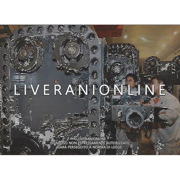 (110930) -- BEIJING, Sept. 30, 2011 () -- File photo taken on April 12, 2006 shows workers working in a workshop of Shenyang Czechoslovakia Machine Tool product sales Co., Ltd. in Shenyang, northeast China\'s Liaoning Province. Can you imagine what the industry of China, now enjoys the title of \'World Factory\', was like a century ago? In 1905, when the imperial Qing government sent five senior officials to Japan and some Western countries to visit, seeking for solutions to save the decaying empire, \'Yanchang Oil Plant\', the first-ever oil enterprise in the Chinese mainland, was established in Yan\'an of northwest China\'s Shaanxi Province. In 1907, Yanchang drilled the first onshore oil well \'Yanyi Well\', starting the oil production in the Chinese mainland. However, in 1907, the oil output could only reach 1 to 1.5 tonnes per day. More than 100 years passed, Yanchang, now called Shaanxi Yanchang Petroleum (Group) Co., LTD, has made great development. In 2007, the crude oil output, oil refining and processing, and sales of oil products of Yanchang respectively exceeded 10 million tonnes, engendering it into an emerging large oilfield with the output of 10 million tonnes. Yanchang is an epitome of Chinese industry\'s centennial development since the 1911 Revolution. The 1911 Revolution, led by Dr. Sun Yat-sen, overthrew the Qing Dynasty (1644-1911) and also put an end to thousands of years of feudalist governance in China. After the revolution, Chinese industry developed as many Chinese factories, in the fields such as textile, flour, match, and steel and iron, were established at that time. However, most Chinese factories were in small scale and did not thrive for a long time. After the founding of the People\'s Republic of China in 1949, step by step, Chinese industry has formed an independent and integral modern industry system with considerable scale and relatively high technical level. Especially in the 30 years after the Chinese governm ©AG ALDO LIVERANI SAS ITALY ONLY *** Local Caption *** .