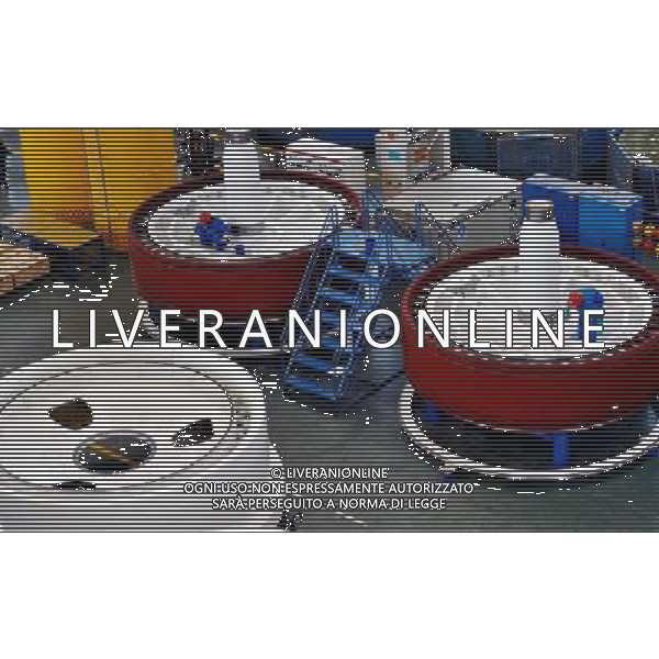 (110930) -- BEIJING, Sept. 30, 2011 () -- File hoto taken on May 11, 2011 shows the producing department of Goldwind Science and Technology Co., Ltd. in Urumqi, capital of northwest China\'s Xinjiang Uygur Autonomous Region. Founded in 1998, Xinjiang Goldwind Science and Technology Co.,Ltd. is one of the largest wind turbine manufacturers in the world with operations in Asia, Australia, Europe, and the Americas. By now, Goldwind\'s independently-developed 3.0 MW turbine has been successfully installed and began operation in Dabancheng of Xinjiang, while the 6 MW turbine is now in research. It owns seven production bases in China and built three research and development centers in the world. Can you imagine what the industry of China, now enjoys the title of \'World Factory\', was like a century ago? In 1905, when the imperial Qing government sent five senior officials to Japan and some Western countries to visit, seeking for solutions to save the decaying empire, \'Yanchang Oil Plant\', the first-ever oil enterprise in the Chinese mainland, was established in Yan\'an of northwest China\'s Shaanxi Province. In 1907, Yanchang drilled the first onshore oil well \'Yanyi Well\', starting the oil production in the Chinese mainland. However, in 1907, the oil output could only reach 1 to 1.5 tonnes per day. More than 100 years passed, Yanchang, now called Shaanxi Yanchang Petroleum (Group) Co., LTD, has made great development. In 2007, the crude oil output, oil refining and processing, and sales of oil products of Yanchang respectively exceeded 10 million tonnes, engendering it into an emerging large oilfield with the output of 10 million tonnes. Yanchang is an epitome of Chinese industry\'s centennial development since the 1911 Revolution. The 1911 Revolution, led by Dr. Sun Yat-sen, overthrew the Qing Dynasty (1644-1911) and also put an end to thousands of years of feudalist governance in China. After the revolution, Chinese industry developed as many ©AG ALDO LIVERANI SAS ITALY ONLY *** Local Caption *** .