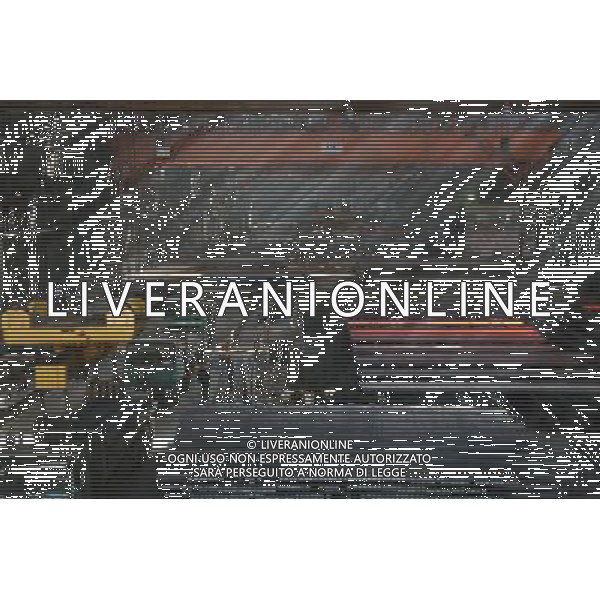 (110930) -- BEIJING, Sept. 30, 2011 () -- The file photo taken on Dec. 29, 2007 shows a workshop of the Shougang Group, in Beijing. Shijingshan Iron and Steel Plant, the predecessor of the Shougang Group, was founded in 1919. With almost a century\'s development, Shougang, now one of the largest steel makers in China, has an annual production capacity of about 8 million tonnes. Can you imagine what the industry of China, now enjoys the title of \'World Factory\', was like a century ago? In 1905, when the imperial Qing government sent five senior officials to Japan and some Western countries to visit, seeking for solutions to save the decaying empire, \'Yanchang Oil Plant\', the first-ever oil enterprise in the Chinese mainland, was established in Yan\'an of northwest China\'s Shaanxi Province. In 1907, Yanchang drilled the first onshore oil well \'Yanyi Well\', starting the oil production in the Chinese mainland. However, in 1907, the oil output could only reach 1 to 1.5 tonnes per day. More than 100 years passed, Yanchang, now called Shaanxi Yanchang Petroleum (Group) Co., LTD, has made great development. In 2007, the crude oil output, oil refining and processing, and sales of oil products of Yanchang respectively exceeded 10 million tonnes, engendering it into an emerging large oilfield with the output of 10 million tonnes. Yanchang is an epitome of Chinese industry\'s centennial development since the 1911 Revolution. The 1911 Revolution, led by Dr. Sun Yat-sen, overthrew the Qing Dynasty (1644-1911) and also put an end to thousands of years of feudalist governance in China. After the revolution, Chinese industry developed as many Chinese factories, in the fields such as textile, flour, match, and steel and iron, were established at that time. However, most Chinese factories were in small scale and did not thrive for a long time. After the founding of the People\'s Republic of China in 1949, step by step, Chinese industry has formed an independe ©AG ALDO LIVERANI SAS ITALY ONLY *** Local Caption *** .