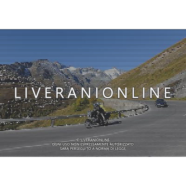 (111004) -- VIENNA, Oct. 4, 2011 () -- Motorcyclists travel on the Grossglockner High Alpine Road in Western Austria Oct. 3, 2011. Drivers and cyclists can enjoy a view of Austria\'s highest mountain, the Grossglockner and its glacier, the Pasterze, on 48 kilometers of high alpine road with 36 bends and an altitude ascent to 2,504 meters. (/Xu Liang) (nxl) AG ALDO LIVERANI S A S ONLY ITALY