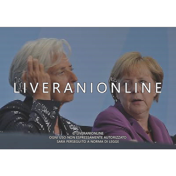 (111006) -- BERLIN, Oct. 6, 2011() --- Managing Director of International Monetary Fund (IMF) Christine Lagarde (L) and German Chancellor Angela Merkel attend a press conference after a high-level meeting on the reform of the international monetary system in Berlin, capital of Germany on Oct. 6, 2011. (/Ma Ning) AG ALDO LIVERANI S A S ONLY ITALY