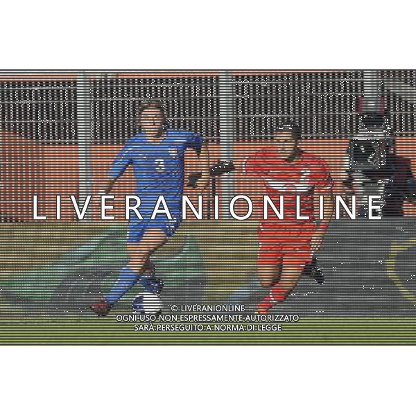 Rieti - 11/10/2011 - Stadio Centro d Italia -Manlio Scopigno - Qualificazioni Europeo Under 21 - Italia vs Turchia - nella foto: alessandro crescenzi e corekci Â© Fabrizio Corradetti - Ag. Aldo Liverani sas