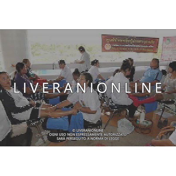 (111013) BANGKOK, Oct. 13, 2011 () People are given massages at a temporary shelter for people displaced by floods, at Thammasat University Convention Center in Thailand\'s capital Bangkok on Oct. 13, 2011. A total of 283 people were confirmed dead and two others were missing in the floods that have inundated the upper part of the country for almost three months, the Disaster Prevention and Mitigation Department reported on Thursday. (/Song Zhenping) (nxl)