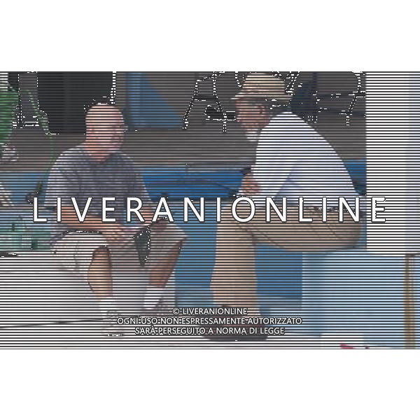 Director CHARLES MARTIN SMITH with MORGAN FREEMAN on the set of Alcon Entertainment\'s family adventure Dolphin Tale a Warner Bros. Pictures release. © LFI - PHOTOSHOT - AG. ALDO LIVERANI SAS ITALY ONLY