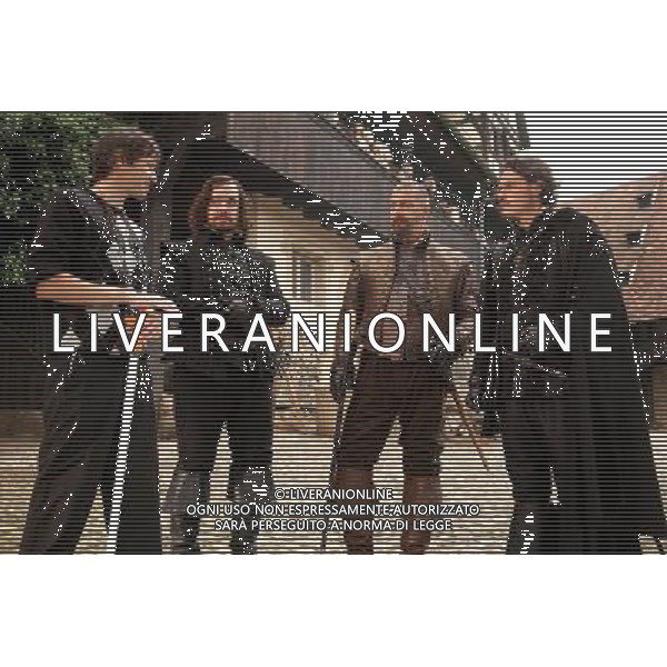 (L to R) Director PAUL W. S. ANDERSON with MATTHEW MACFADYEN, RAY STEVENSON and LUKE EVANS on the set of THE THREE MUSKETEERS. © LFI - PHOTOSHOT - AG. ALDO LIVERANI SAS ITALY ONLY FILM: \' I TRE MOSCHETTIERI 3D\' ( 2011)