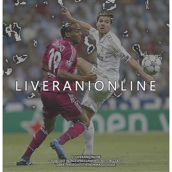 Real Madrid\'s Xabi Alonso and Olympique Lyonaise\' Jimmy Briand during Champions League match on october 18th, 2011 Photo: Cesar Cebolla / ALFAQUI CHAMPIONS LEAGUE REAL MADRID LIONE AGENZIA ALDO LIVERANI ITALY ONLY
