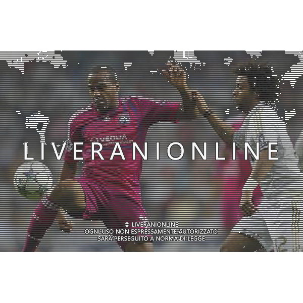 Real Madrid\'s Marcelo and Olympique Lyonaise\' Jimmy Briand during Champions League match on october 18th, 2011 Photo: Cesar Cebolla / ALFAQUI CHAMPIONS LEAGUE REAL MADRID LIONE AGENZIA ALDO LIVERANI ITALY ONLY