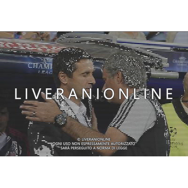 Real Madrid\'s Jose Mourinho and Olympique coach Remi Garde Lyonaise\' during Champions League match on october 18th, 2011 Photo: Cesar Cebolla / ALFAQUI CHAMPIONS LEAGUE REAL MADRID LIONE AGENZIA ALDO LIVERANI ITALY ONLY