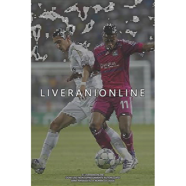 Real Madrid\'s Angel di Maria and Olympique Lyonaise\' Michel Bastos during Champions League match on october 18th, 2011 Photo: Cesar Cebolla / ALFAQUI CHAMPIONS LEAGUE REAL MADRID LIONE AGENZIA ALDO LIVERANI ITALY ONLY