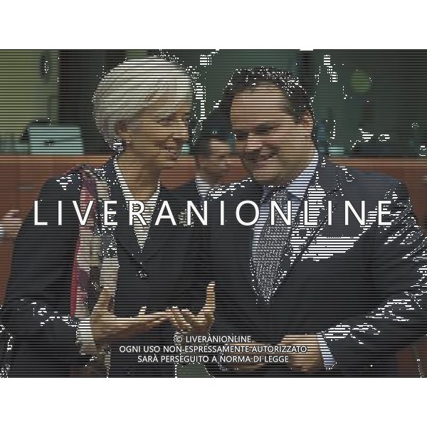 IMF Managing Director Christine Lagarde (L) and Dutch Finance Minister Jan Kees de Jager during a meeting of eurozone finance ministers in Brussels, Belgium on 2011-10-21 The chairman of the eurogroup of finance ministers says the delay to a debt crisis creates a \'disastrous\' image of the eurozone to the outside world. Jean-Claude Juncker, who is also the prime minister of Luxembourg, added that it\'s not necessarily just France and Germany that have differences of opinion on how to tackle the crisis. by Wiktor Dabkowski - Photoshot - Ag. Aldo Liverani sas ITALY ONLY BRUXELLES - MEETING DEI MINISTRI DELLE FINANZE DELLA ZONA EURO