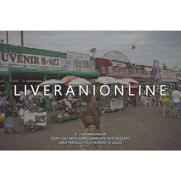 Businesses on the boardwalk at Coney Island in Brooklyn in New York on Saturday, July 23, 2011. Nine of the iconic businesses located on property run by Central Amusement International. including Ruby\'s Bar and Grill. have not had their leases renewed and will close. new york city - situazioni ©photoshot/AG ALDO LIVERANI SAS ITALY ONLY