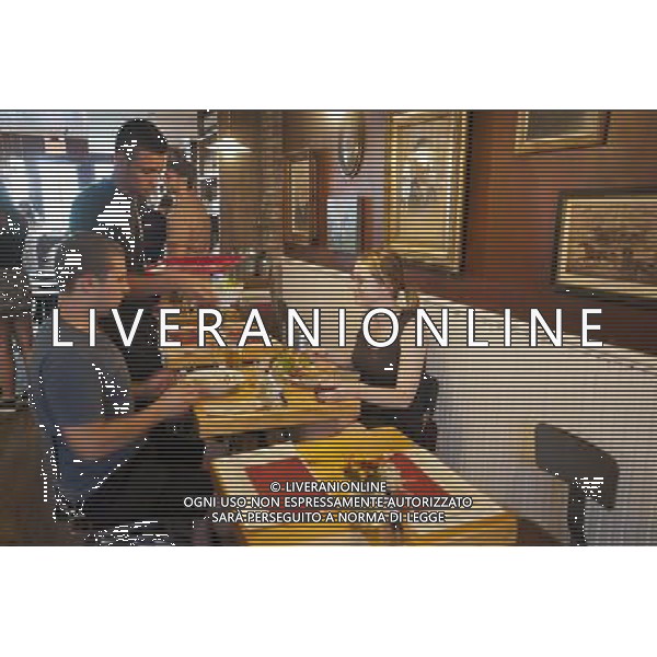 Diners in the new Meatball Shop on Bedford Street in the hipster Williamsburg neighborhood of Brooklyn in New York seen on Tuesday, July 12, 2011. The popular eatery, where the original is on the Lower East Side of New York, serves meatball heroes, sliders, and bowls with an array of daily specials. The meatball menu allows you to mix and match your meal with various sauces, meats and sides. new york city - situazioni ©photoshot/AG ALDO LIVERANI SAS ITALY ONLY
