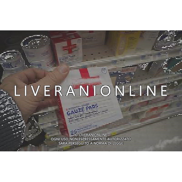Johnson \' Johnson gauze pads and other products on a supermarket shelf on Tuesday, October 18, 2011. Johnson \' Johnson\'s reported that third-quarter profits have fallen 6 percent citing overhead on production costs and a foreign exchange charge. new york city - situazioni ©photoshot/AG ALDO LIVERANI SAS ITALY ONLY