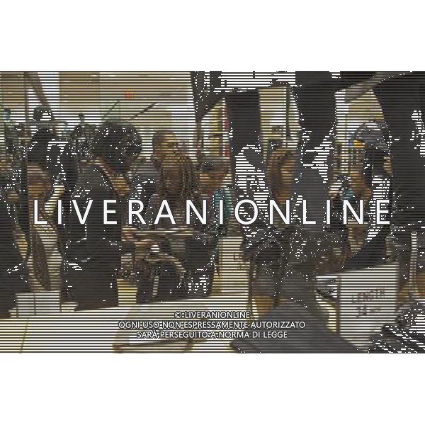 Customers shop at the grand opening of the Uniqlo store on West 34th street in New York on Friday, October 21, 2011. The new store is Fast Retailing\'s third store in New York, opening just a week after its Fifth Avenue flagship store. Fast Retailing plans on opening 200 to 300 stores worldwide until 2020 and currently has 1000 stores. new york city - situazioni ©photoshot/AG ALDO LIVERANI SAS ITALY ONLY