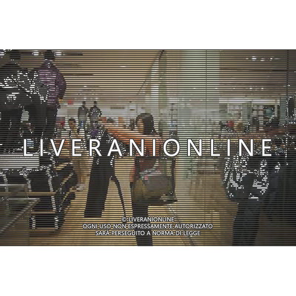 Customers shop at the grand opening of the Uniqlo store on West 34th street in New York on Friday, October 21, 2011. The new store is Fast Retailing\'s third store in New York, opening just a week after its Fifth Avenue flagship store. Fast Retailing plans on opening 200 to 300 stores worldwide until 2020 and currently has 1000 stores. new york city - situazioni ©photoshot/AG ALDO LIVERANI SAS ITALY ONLY