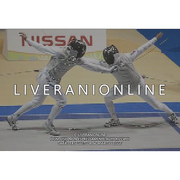 (111026) -- GUADALAJARA, Oct. 26, 2011 () -- Felipe Alvear (L) of Chile competes with Antonio Leal (R) of Venezuela in the men\'s fencing competition during the Pan American Games Guadalajara 2011, at Multipurpose Gymnasium, in Guadalajara, Jalisco, Mexico, on Oct. 25, 2011. (/Bao Feifei) ©photoshot/Agenzia Aldo Liverani Sas - ITALY ONLY - Giochi Panamericani di Guadalajara 2011, presso Palestra polivalente, in Guadalajara, Jalisco, Messico, il 25 ottobre 2011.