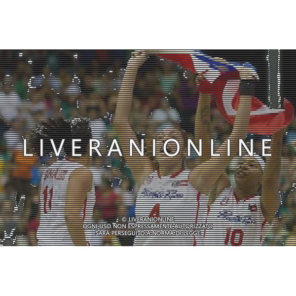 (111026) -- GUADALAJARA, Oct. 26, 2011 () -- Ma Gonzalez (L), An Bermudez (C) and Yolanda Jones (R) of Puerto Rico celebrate after the women\'s basketball final during the Pan American Games Guadalajara 2011, at CODE Dome, in Guadalajara, Jalisco, Mexico, on Oct. 25, 2011. (/Pedro Mera) ©photoshot/Agenzia Aldo Liverani Sas - ITALY ONLY - Giochi Panamericani di Guadalajara 2011, presso Palestra polivalente, in Guadalajara, Jalisco, Messico, il 25 ottobre 2011.