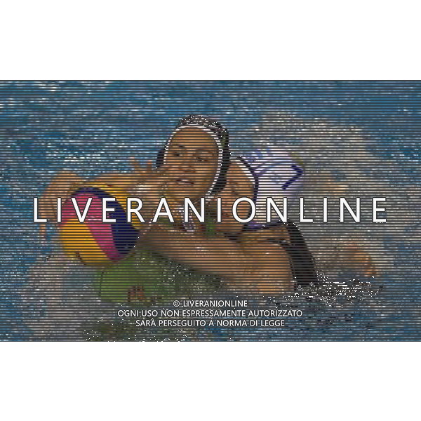 (111027) -- ZAPOPAN, Oct. 27, 2011 () -- Kimberly Romero (L) of Mexico vies with Julieta Kruger (R) of Argentina in the women\'s classification waterpolo competition during the Pan American Games Guadalajara 2011, at Scotiabank Aquatics Center in Zapopan, Jalisco, Mexico, on Oct. 26, 2011. (/Claudio Cruz) AG ALDO LIVERANI S A S ONLY ITALY