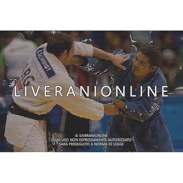 (111027) -- GUADALAJARA, Oct. 27, 2011 () -- Cristian Schmidt (L) of Argentina competes with Diego Armando Ochoa (R) of El Salvador in the men\'s -100 kg quarterfinal judo competition during the Pan American Games Guadalajara 2011, at Nissan Gymnastics Complex, in Guadalajara, Jalisco, Mexico, on Oct. 26, 2011. (/Pedro Mera) AG ALDO LIVERANI S A S ONLY ITALY